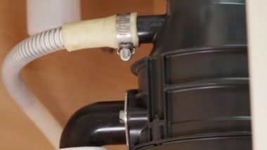 This is an image of a garbage disposal dishwasher inlet connection